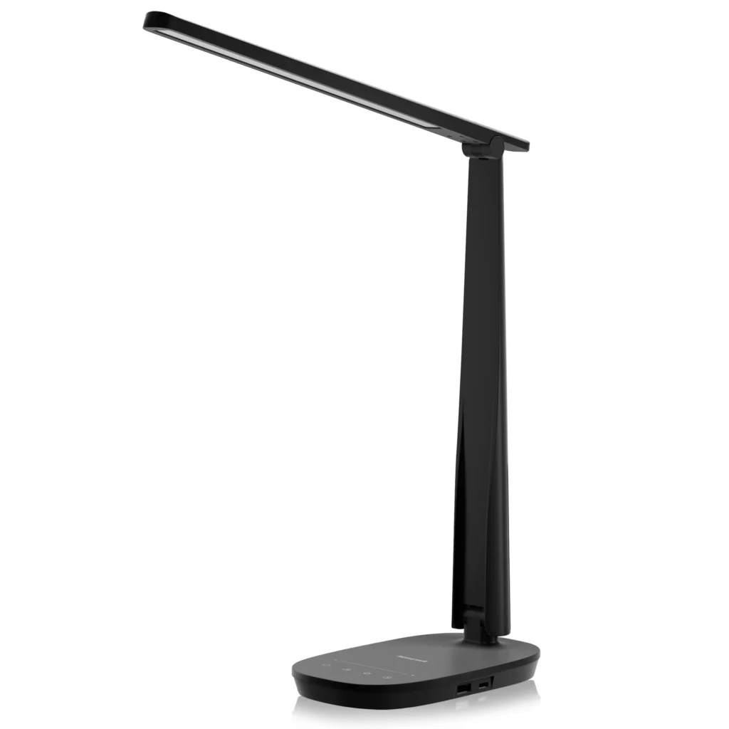 Honeywell SuntruraLux LED desk lamp in black featuring a sleek, modern design with an adjustable arm. The lamp includes touch-sensitive controls on the base and a built-in USB charging port.