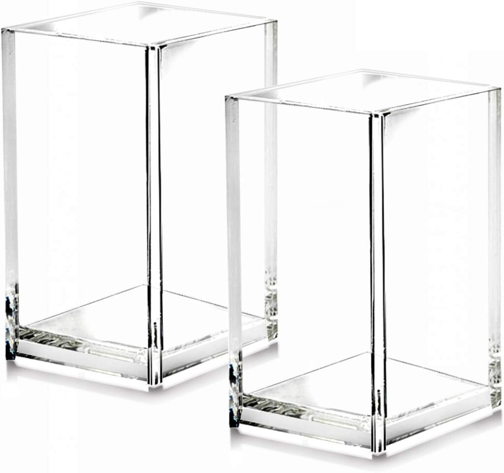 Pair of transparent acrylic pen holder cups with a sleek, rectangular design. Each holder is clear and sturdy, providing an elegant and modern look for organizing pens, pencils, and other small office supplies on a desk.