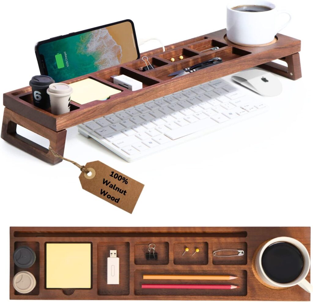 The Ample Co. wooden desk organizer made from 100% walnut wood, featuring multiple compartments for holding a smartphone, sticky notes, pens, clips, and a coffee cup.