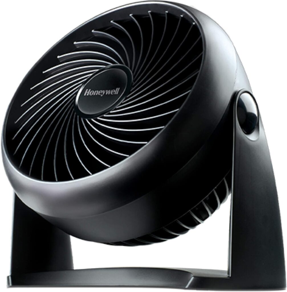  Honeywell TurboForce table fan in black, featuring a compact design and adjustable head for targeted airflow